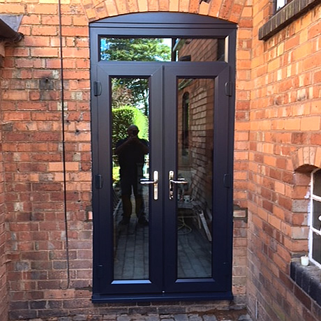 double glazed french doors with fixed light in a black woodgrain installed in solihull by, www.solihullwindows.co.uk