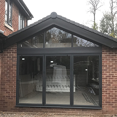 A Smart Aluminium bi-folding door finished in anthracite grey finish installed in St. Bearnards Road, Solihull