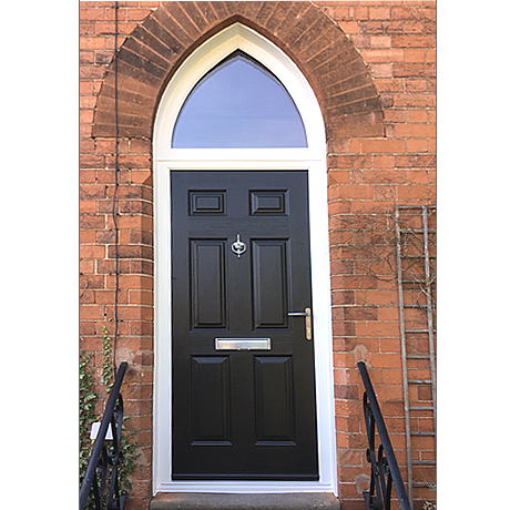 Installed composite entrance door with gothic head by solihull windows....